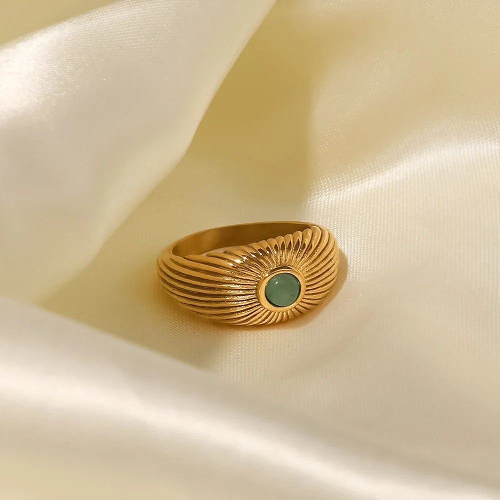 Green Stone Geometric Wrap Ring showcasing modern elegance with a vibrant green stone and gold finish.