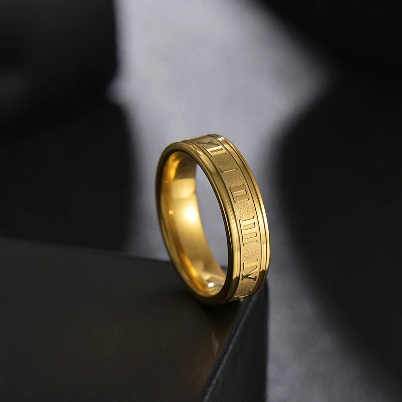 Stainless Steel Numeral Rings showcasing a modern gold fashion band with engraved numeral details.