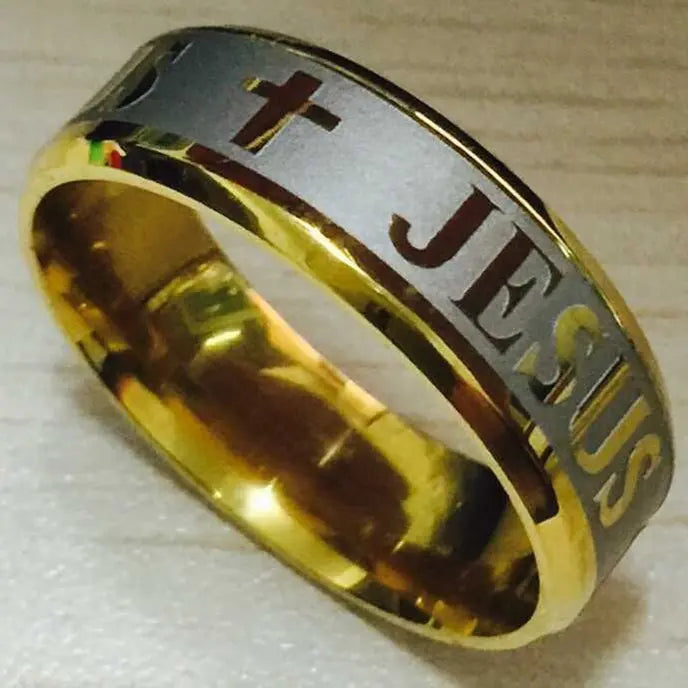 Bible Scripture Titanium Ring showcasing gold and silver design with engraved 'Jesus' and cross detail.