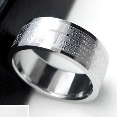 Bible Scripture Titanium Ring displayed with engraved religious text and a cross design.