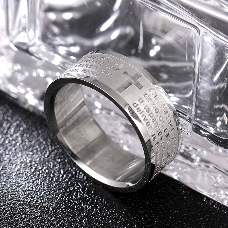 Bible Scripture Titanium Ring with engraved text and cross design, showcasing modern style and durability for men and women.