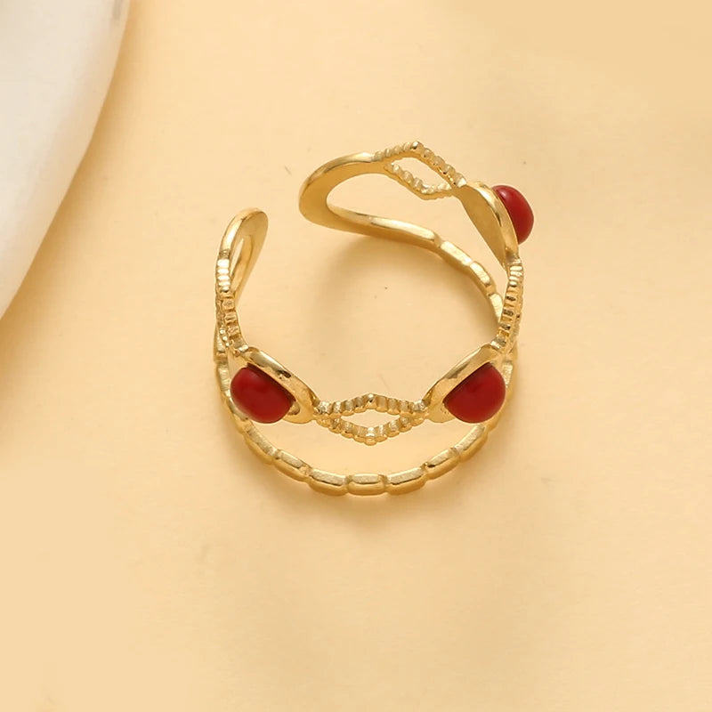 Timeless trendy stone layered ring - featuring a gold design with red stones, perfect for elevating any outfit.