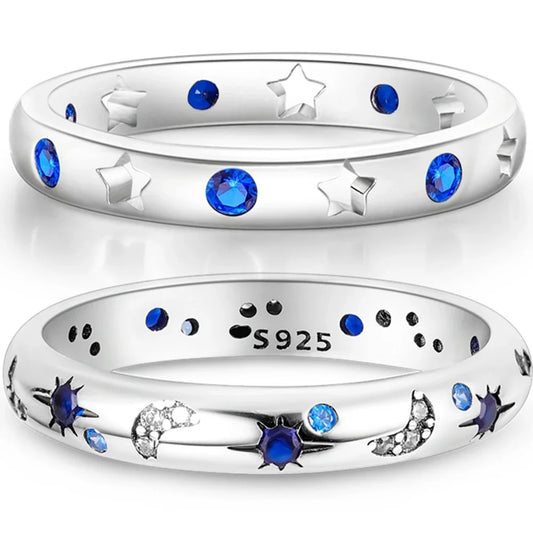 Sterling Silver Wedding Engagement Ring with blue zircon and celestial star and moon designs.