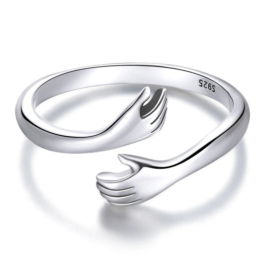 Sterling Silver Warmth Adjustable Ring showcasing a unique hand-hug design in genuine 925 sterling silver.